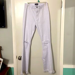 White, denim bell bottom jeans.